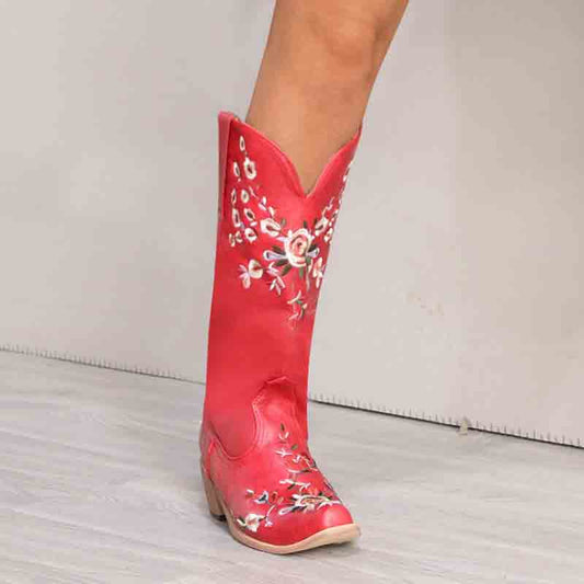 Flower embroidered cowgirl boots for women in red with vibrant floral designs on the side