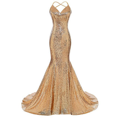 Gold sequined glamorous evening mermaid dress with spaghetti straps and a flared train