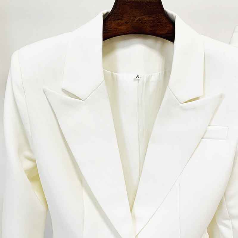 Elegant white high waisted wedding pantsuit by Tucomosi with a stylish lapel collar