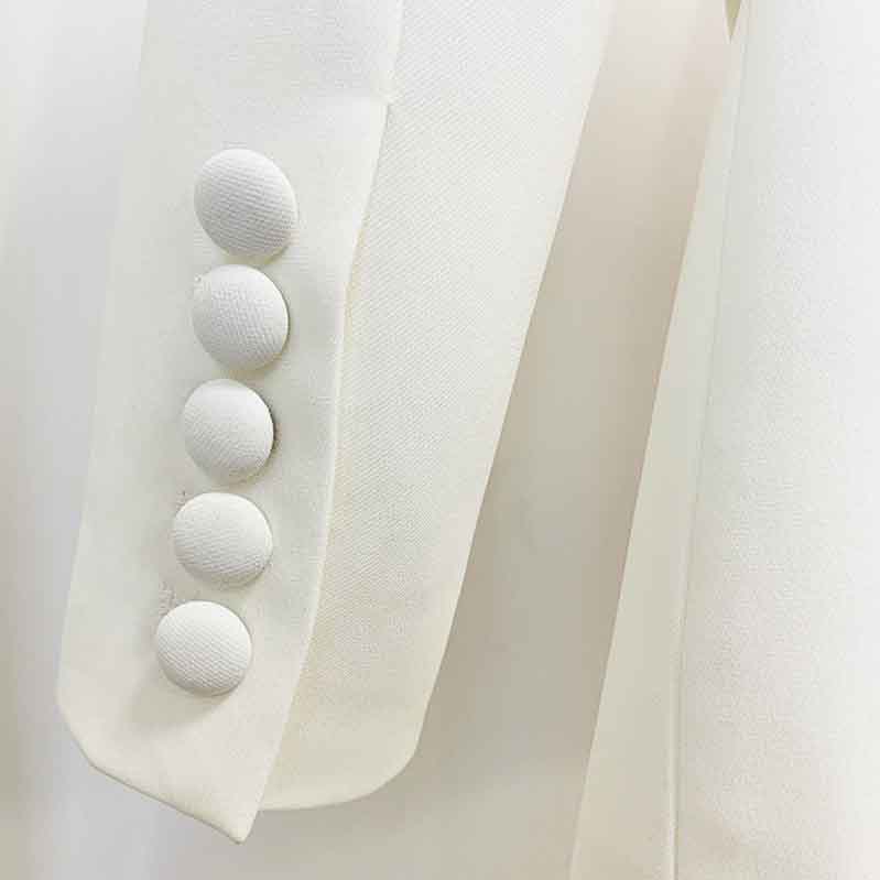 Close-up of the sleeve detailing on Tucomosi high waisted wedding pantsuit with elegant buttons