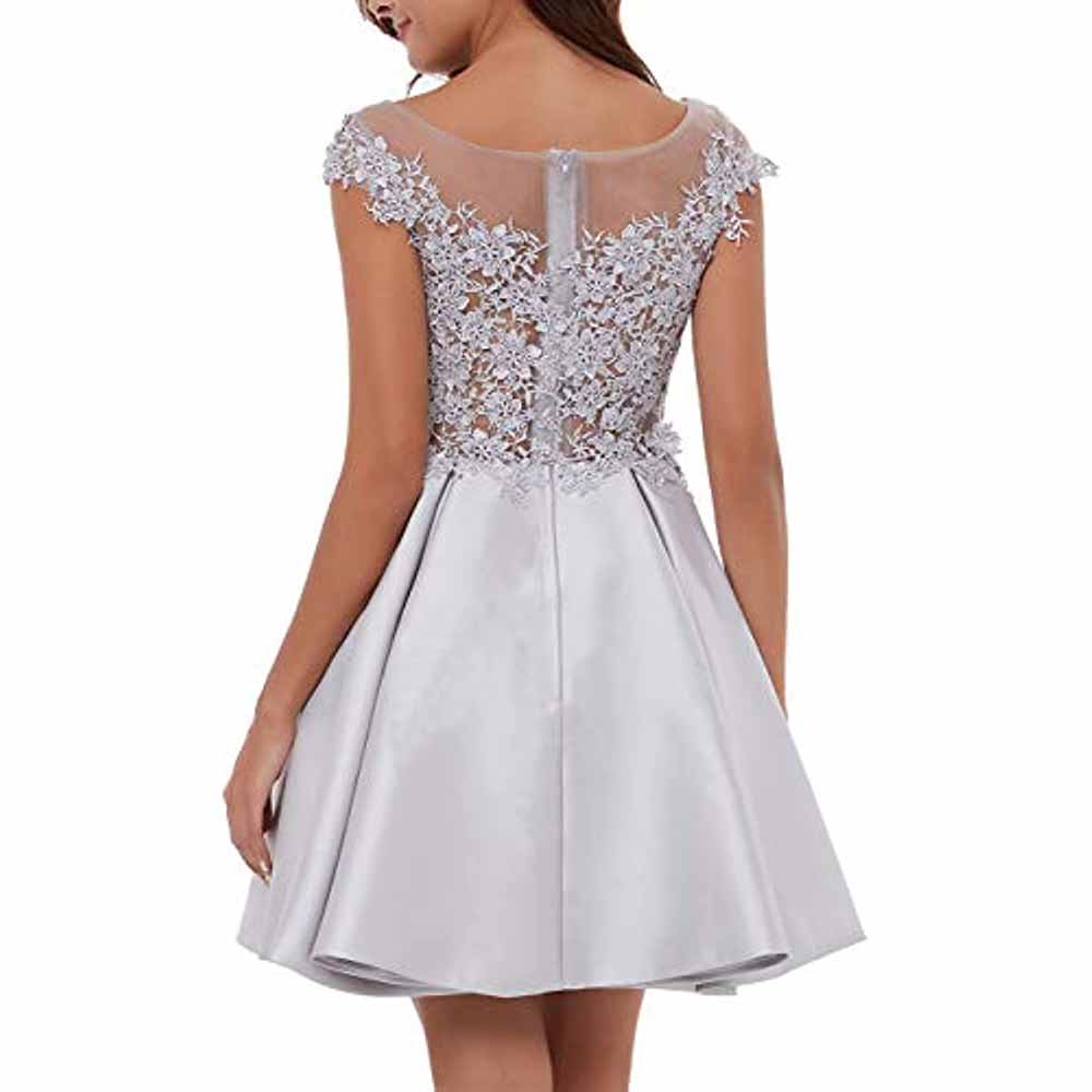 Elegant lace applique homecoming dress with a fitted bodice and flared skirt in light silver.