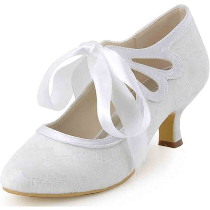 Elegant lace wedding shoes for bride with decorative cutouts and stylish ribbon ties