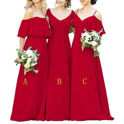 Three bridesmaids in elegant red long chiffon bridesmaid dresses holding floral bouquets