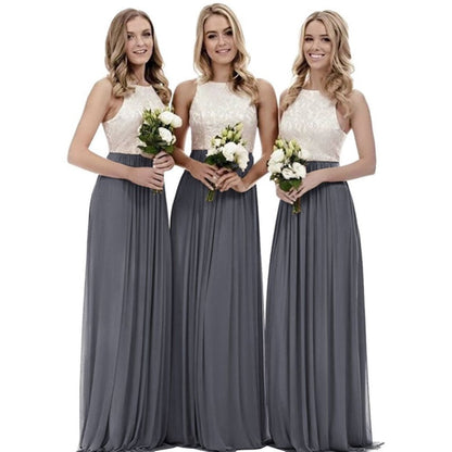 Three Models in Long Lace Bridesmaid Dresses with Lace Bodice and Flowing Skirts Holding Bouquets