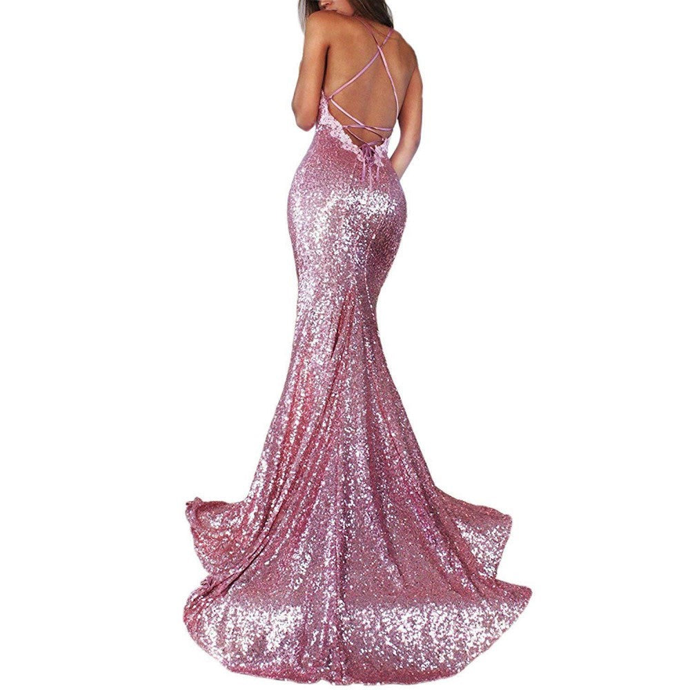 Elegant pink mermaid sequin prom dress with a backless design and flared train