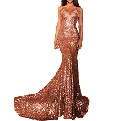 Glamorous mermaid sequin prom dress in rose gold with a fitted silhouette and elegant train