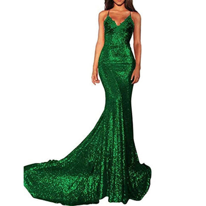 Elegant green mermaid sequin prom dress with a flattering fit and dramatic train for special occasions
