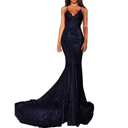 Elegant navy mermaid sequin prom dress with a flattering silhouette and flowing train