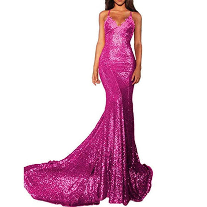 Gorgeous mermaid sequin prom dress in vibrant pink with a flowing train for elegant occasions