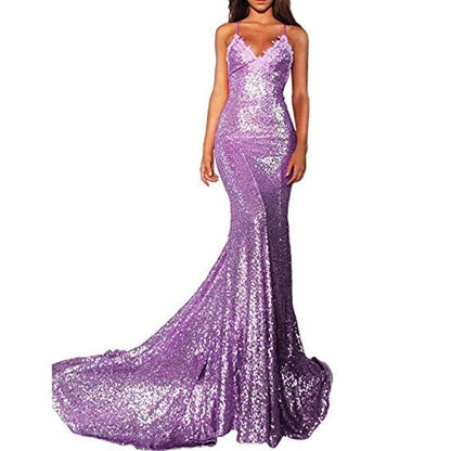 Stunning mermaid sequin prom dress in purple with a fitted bodice and flowing train