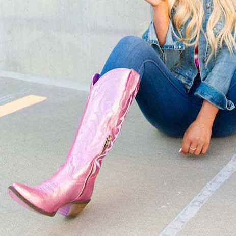 Stylish metallic cowgirl boots for women in pink, perfect for casual outfits and country events.