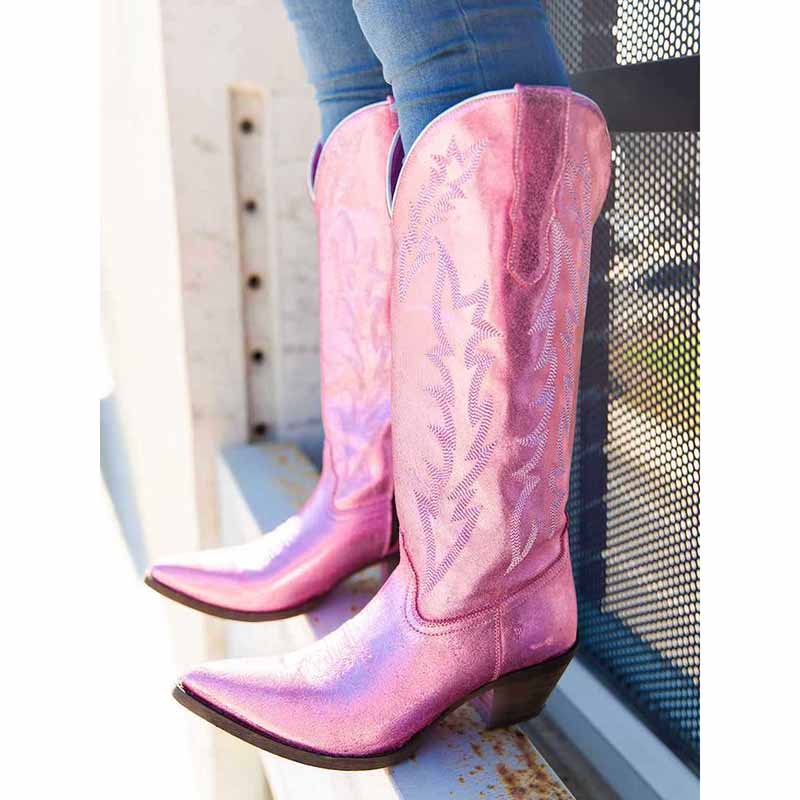 Stylish metallic cowgirl boots for women in pink with detailed stitching and pointed toes