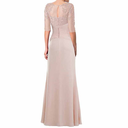 Elegant mother of the bride chiffon lace gown in soft beige with detailed back design and flowing skirt