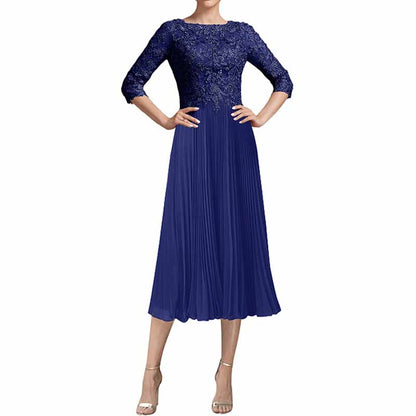 Elegant mother of the bride dress tea length in navy with lace bodice and pleated skirt