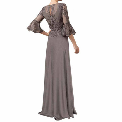 Elegant mother of the bride formal dress with lace sleeves and a flowing silhouette in a soft gray color