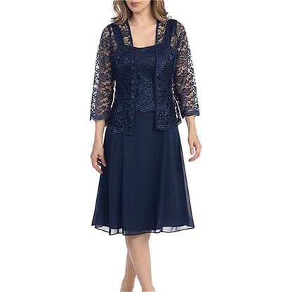 Elegant mother of the bride lace dress with jacket in navy, featuring a flowing skirt and three-quarter sleeves
