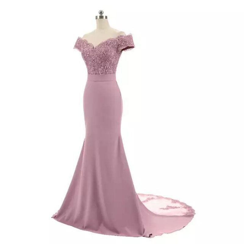 Pink off shoulder wedding dress for women with lace bodice and long train on mannequin