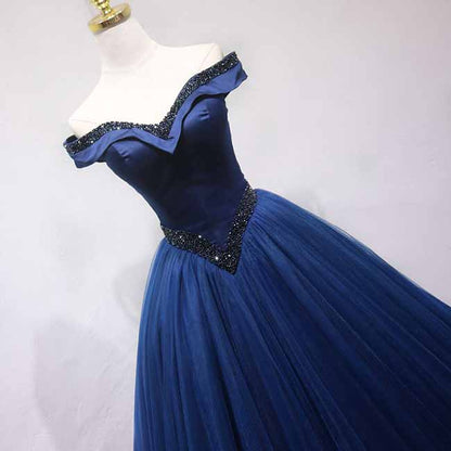 Elegant off the shoulder ball gown prom dress in navy blue with sparkling bead detailing