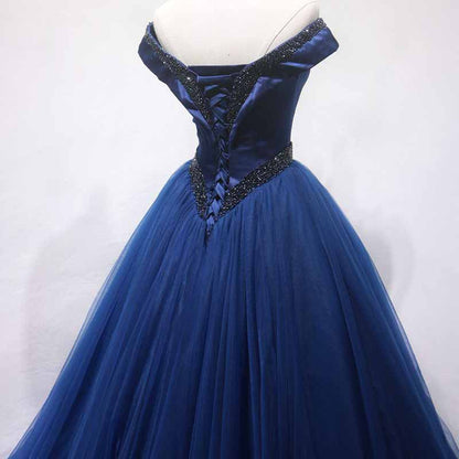 Elegant off the shoulder ball gown prom dress in navy blue with intricate lace details on the back