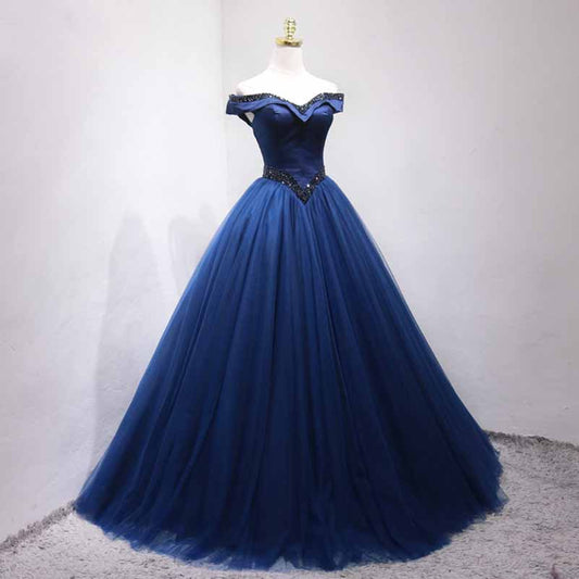 Elegant off the shoulder ball gown prom dress in navy blue with a fitted bodice and tulle skirt