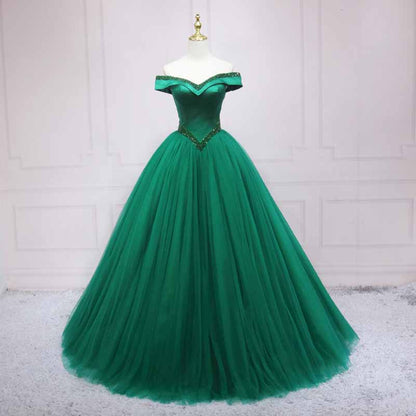 Elegant green off the shoulder ball gown prom dress with a fitted bodice and flowing tulle skirt