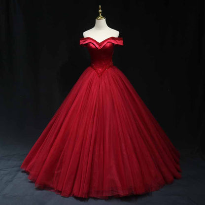 Elegant red off the shoulder ball gown prom dress with a flowing tulle skirt and sweetheart neckline