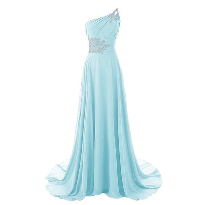 Elegant blue one shoulder ombre prom dress with jeweled detailing and flowing skirt