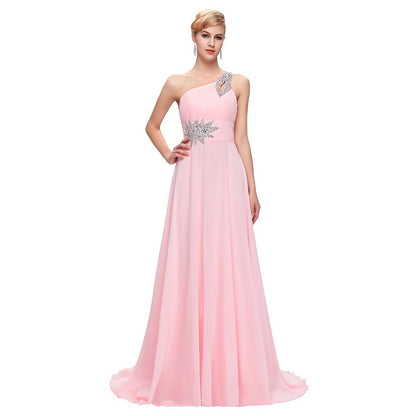 Elegant pink one shoulder ombre prom dress with jeweled embellishments and flowing skirt