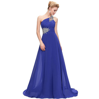 Elegant blue one shoulder ombre prom dress with silver embellishments and flowing skirt