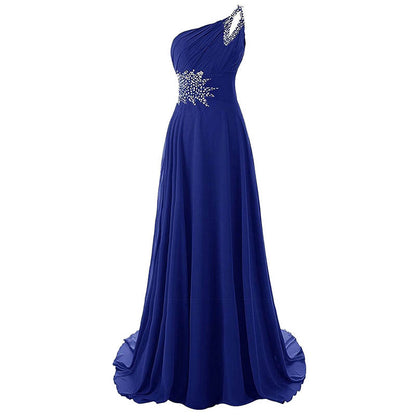 Elegant blue one shoulder ombre prom dress with rhinestone detailing and flowing skirt