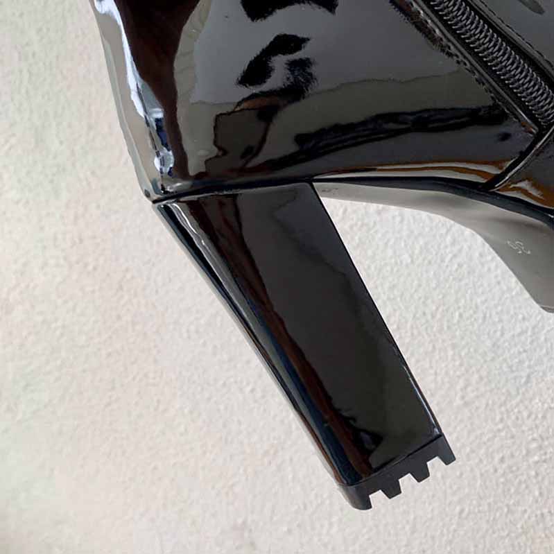 Stylish black platform high heel boots for women with a glossy finish and zipper detail