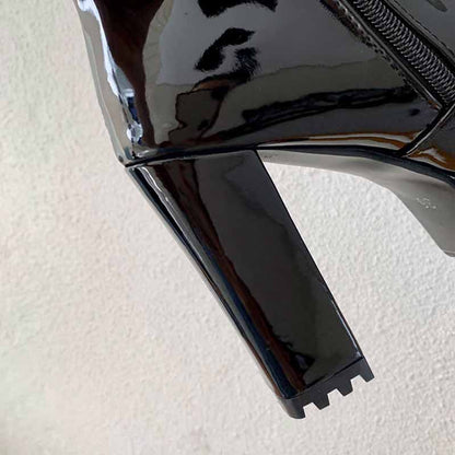 Stylish black platform high heel boots for women with a glossy finish and zipper detail