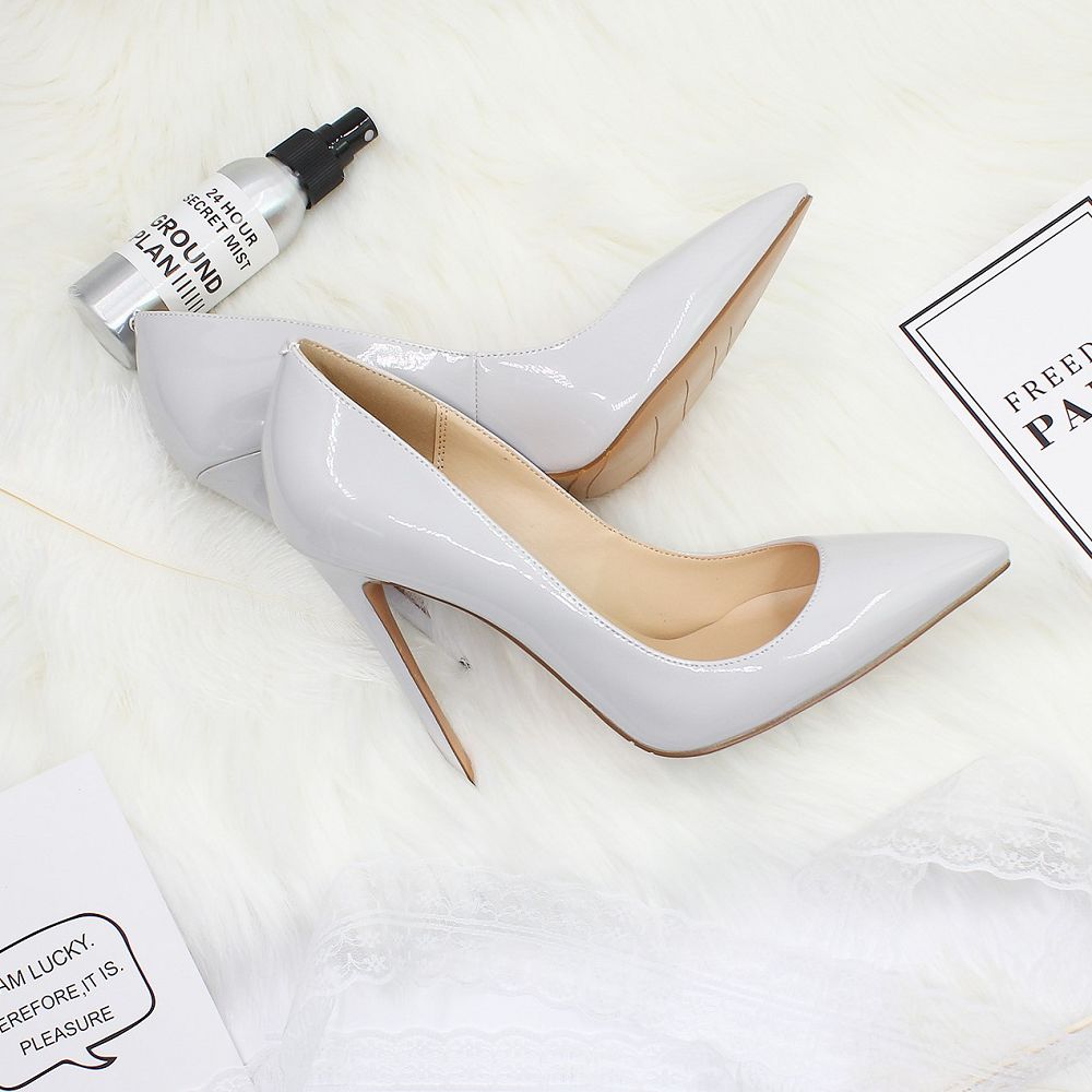 White pointed toe prom shoes in sleek gray with a glossy finish and high heels