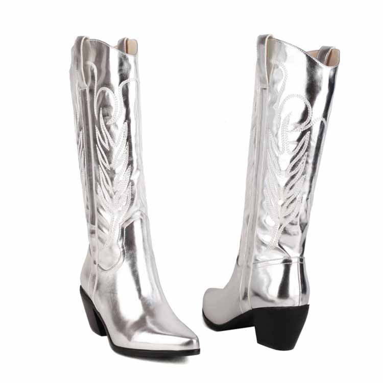 Shiny silver pointed toe western knee high boots with decorative stitching and block heels