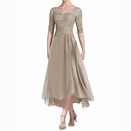 Elegant ruffle wedding guest dress for women in taupe with lace detailing and a flowy skirt