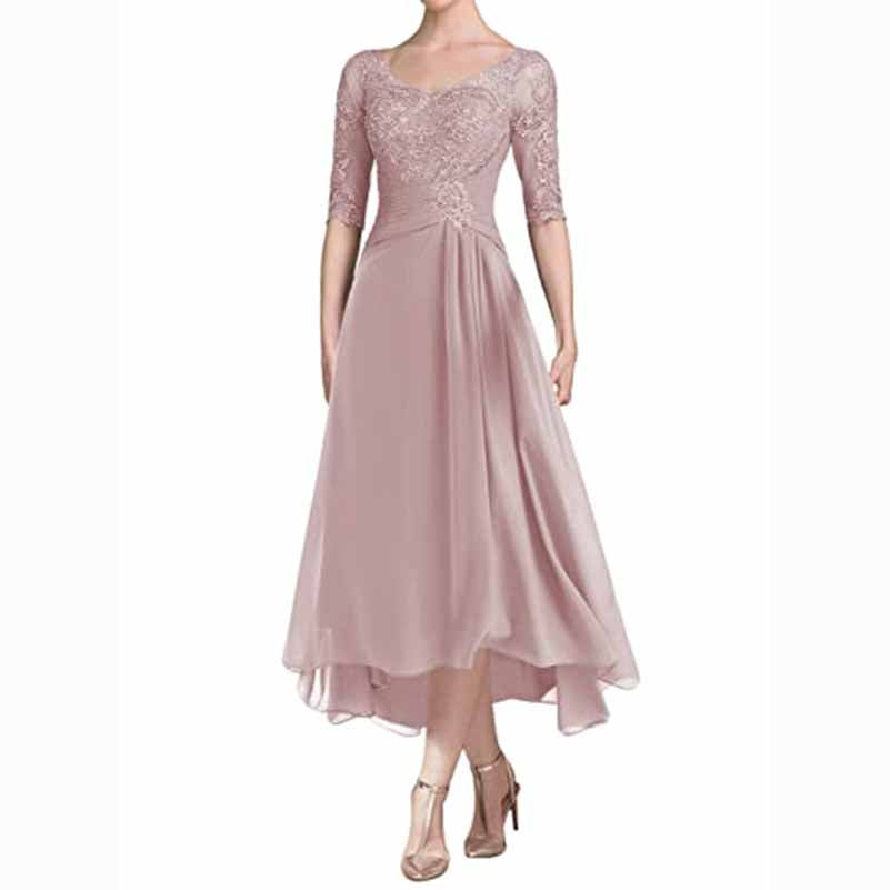 Elegant ruffle wedding guest dress for women in soft pink with lace sleeve and flowing skirt