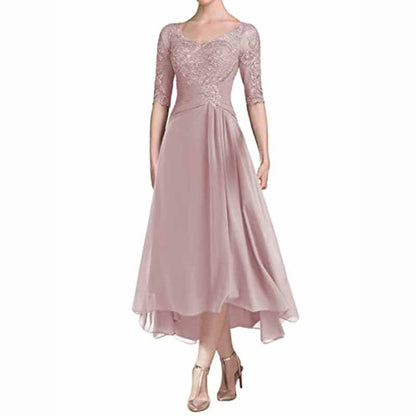 Elegant ruffle wedding guest dress for women in soft pink with lace sleeve and flowing skirt