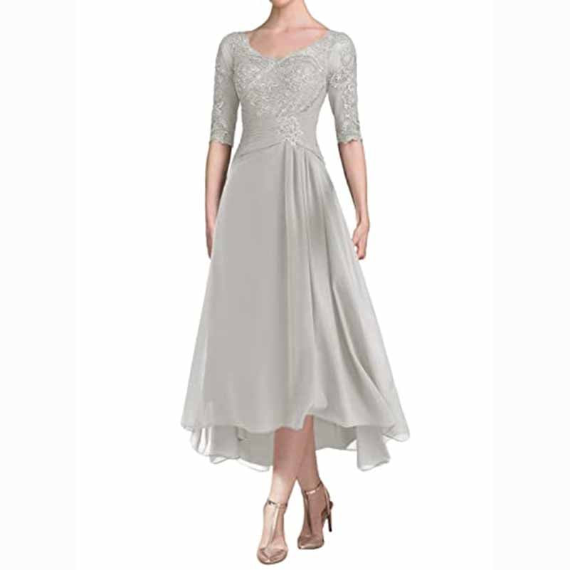 Elegant ruffle wedding guest dress for women in light gray with intricate bead detailing and a flowy design
