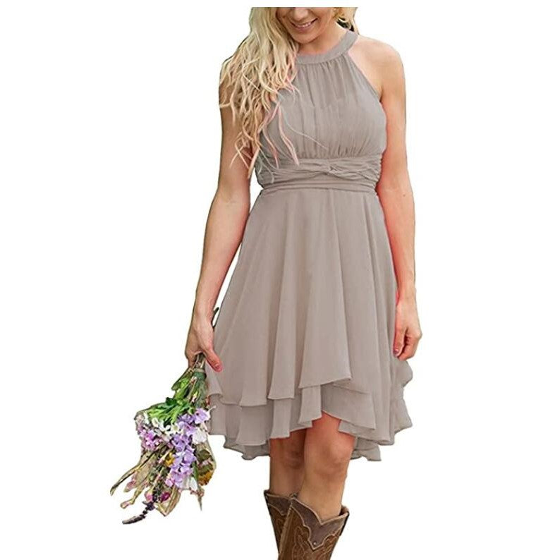 Elegant cowgirl bridesmaid dress for rustic wedding in taupe with a flowy skirt and halter neckline