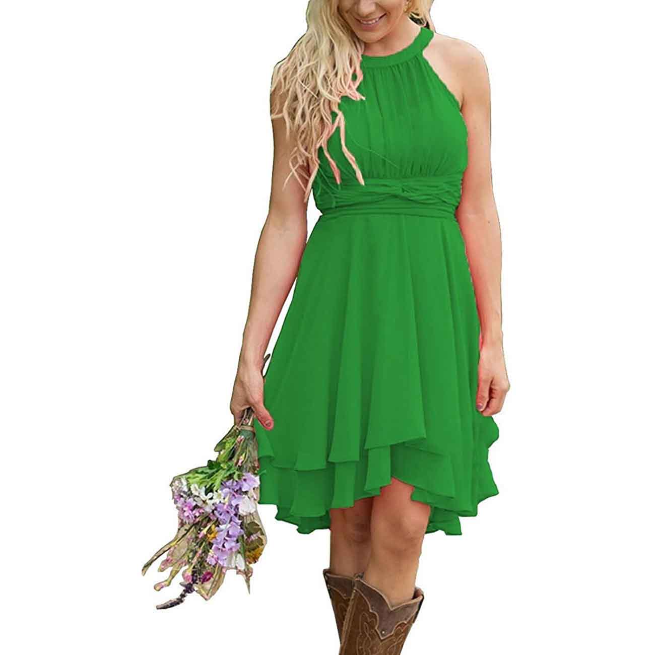 Green cowgirl bridesmaid dress for rustic wedding with a flattering fit and flowing design