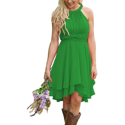 Green cowgirl bridesmaid dress for rustic wedding with a flattering fit and flowing design
