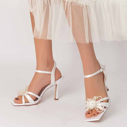Elegant S&DCo. satin pump heel sandal for bridesmaids with floral accents and ankle strap
