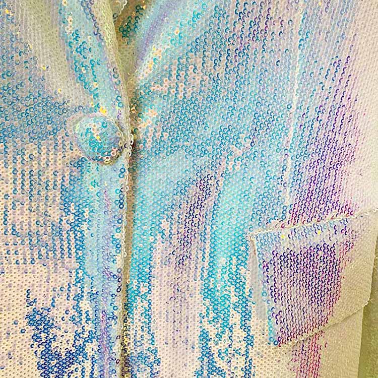 Sparkly blazer and shorts set in iridescent colors with sequin detailing and button closure