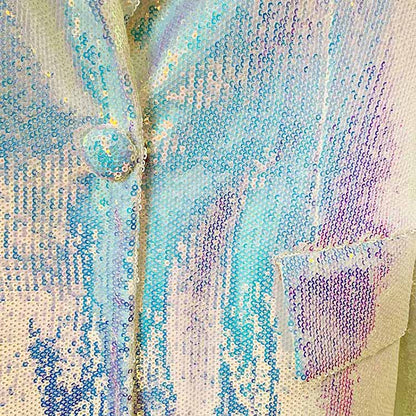 Sparkly blazer and shorts set in iridescent colors with sequin detailing and button closure