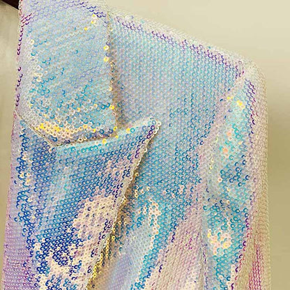 Sparkly blazer and shorts set with shimmering sequins in pastel colors, perfect for stylish occasions