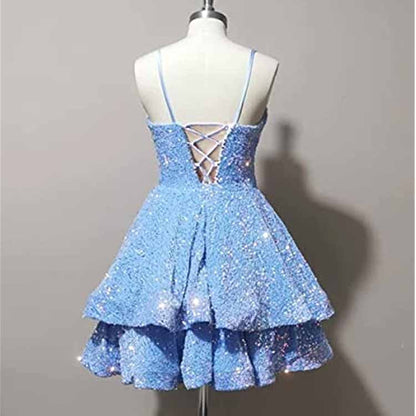 Sparkly short homecoming dress in blue with layered skirt and crisscross back design