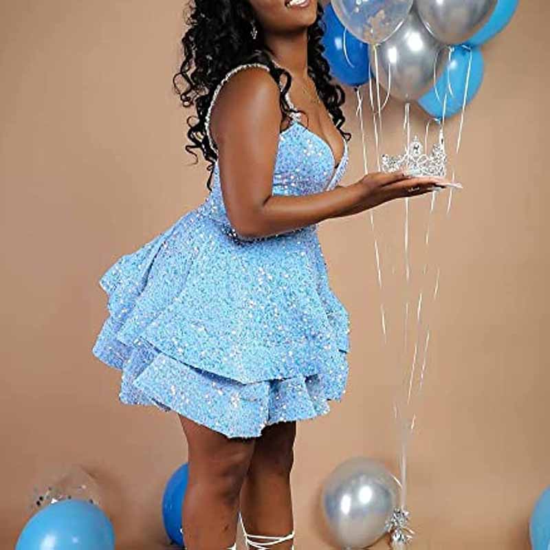 Sparkly short homecoming dress in blue with layered skirt and spaghetti straps, perfect for celebratory events
