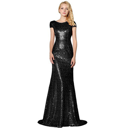 Elegant sparkly wedding ball gown with a fitted silhouette and elegant train for a stunning bridal look