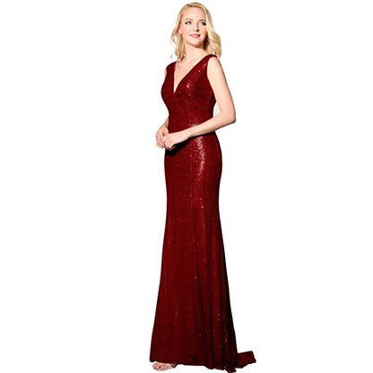 Elegant sparkly wedding ball gown in deep red with a flattering V-neck and fitted silhouette