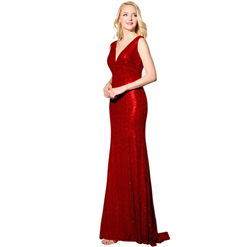 Elegant sparkly wedding ball gown in red with a flattering V-neck design and fitted silhouette